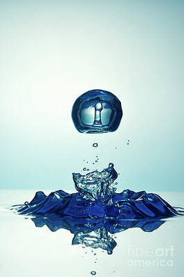 Wall Art featuring the photograph Splashing Droplet Into Water by Sami Sarkis Photography