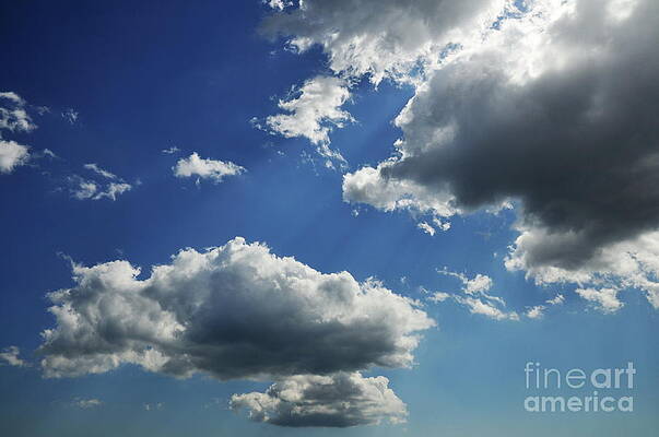 Wall Art featuring the photograph White And Gray Clouds In Blue Sky by Sami Sarkis Photography