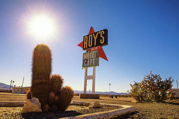 Vintage Wall Art featuring the photograph Vintage Neon Sign Of Roy's Motel And Cafe On Route 66  #1 by Miroslav Liska