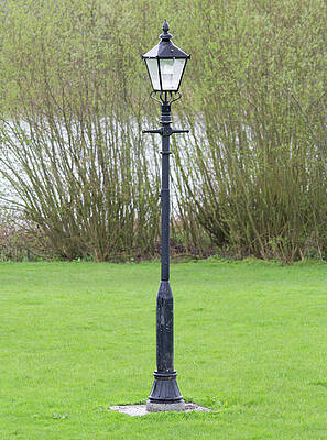 Isolate Wall Art featuring the photograph Antique Lamp Post Near Water by Scott Lyons
