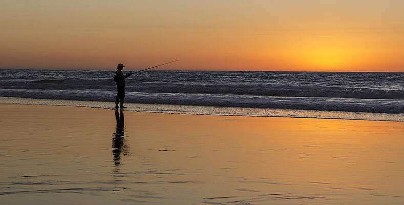 Photograph - Beach Fishing At Sunset by Ed Clark