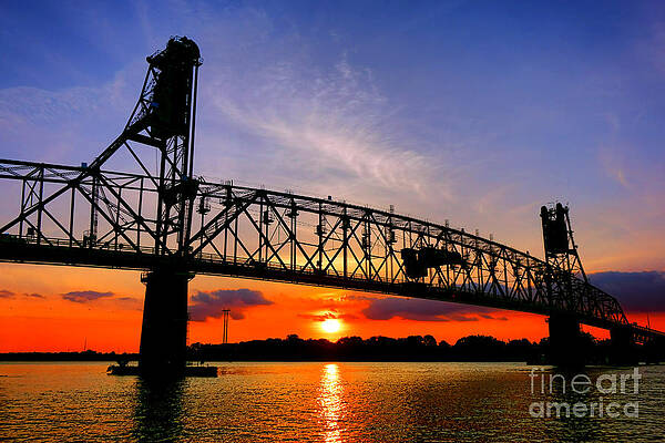 Dramatic Sunset Over Bridge Photograph