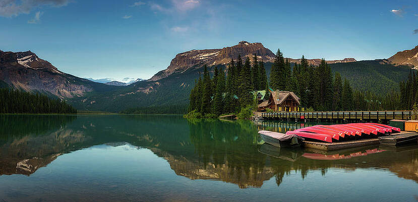 Wall Art featuring the photograph Canoes On Beautiful Emerald Lake In Yoho National Park, Canada by Miroslav Liska
