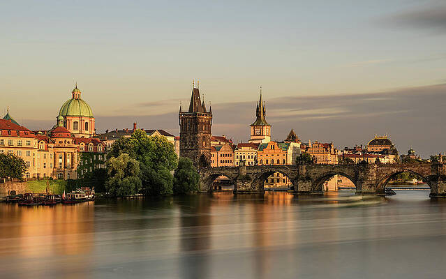 Summer Wall Art featuring the photograph Charles Bridge In Prague At Sunset by Miroslav Liska