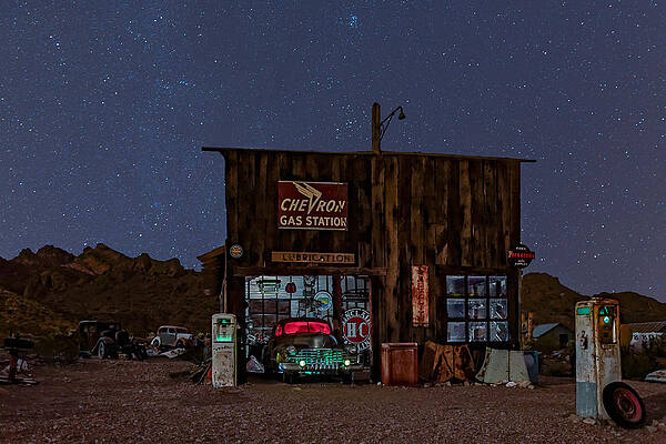 Country Photograph - Chevron Gas Station Under The Stars by Susan Candelario