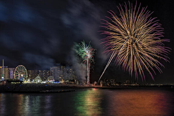 Vibrant Fireworks Over City Skyline Photograph
