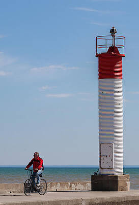Wall Art featuring the photograph Cyclist By The Lighthouse by Al Poullis