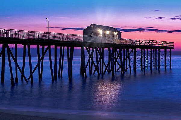 Dramatic Sunrise Over Pier Photograph