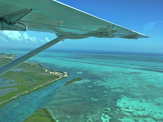 Wall Art featuring the photograph Flying Into Ambergris Caye, Belize by Waterdancer