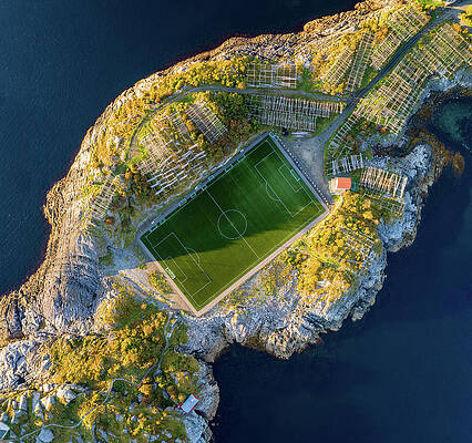 Football field in Henningsvaer from above by Miroslav Liska