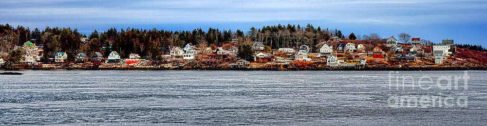 Charming Coastal Village Under Blue Skies Photograph
