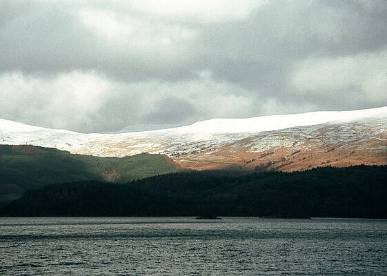 Wall Art featuring the photograph Glowering by Kenneth Campbell