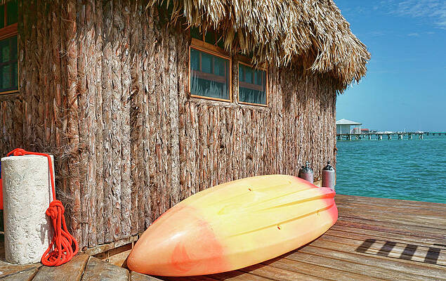 Wall Art featuring the photograph Grass Hut On Ambergris Caye Belize by Waterdancer