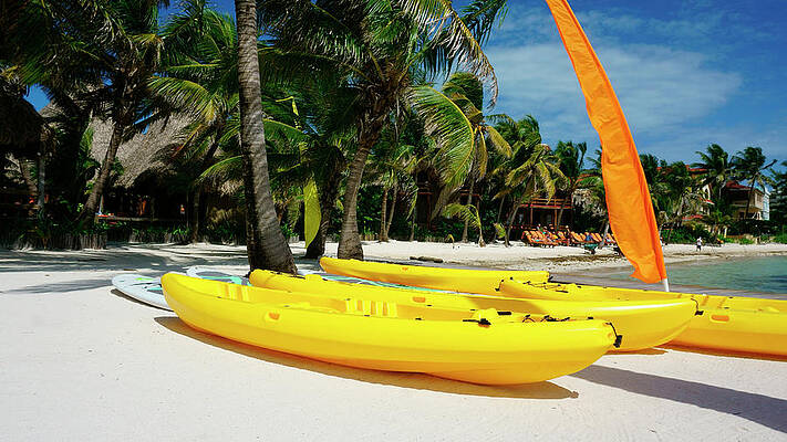 Wall Art featuring the photograph Kayaks On The Beach Of Ambergris Caye Belize by Waterdancer