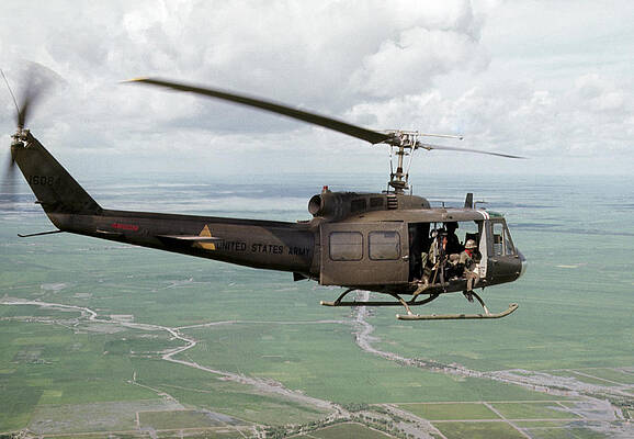 Military Helicopter in Flight Photograph