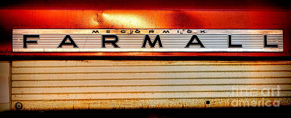Wall Art featuring the photograph Mc Cormick Farmall Antique Nameplate by Olivier Le Queinec