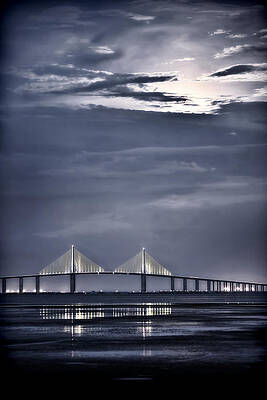 Illuminated Suspension Bridge at Night Photograph