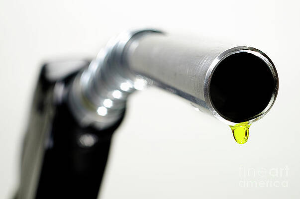 Wall Art featuring the photograph Oil Drop Coming Out Of Petrol Pump Nozzle by Sami Sarkis Photography