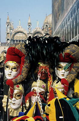 Wall Art featuring the photograph Person Surrounded By Elaborate Masks For Sale On St Mark's Basilica by Sami Sarkis Photography
