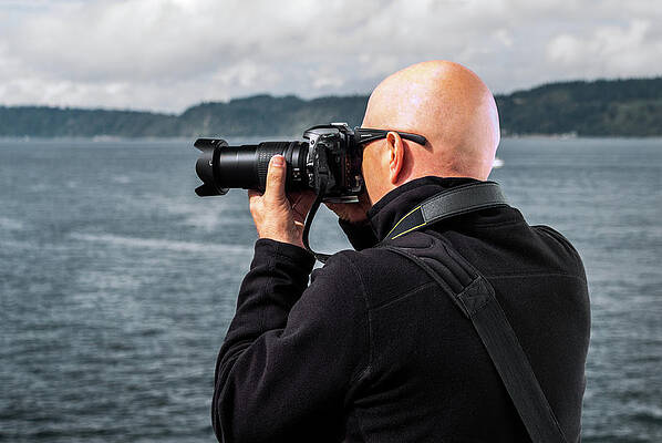 Cloud Wall Art featuring the photograph Photographer At Work by Ed Clark