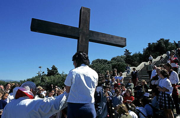 Wall Art featuring the photograph Priest Leading Prayer On A Good Friday Procession Outside Notre Dame De La Garde Basilica  Marseille by Sami Sarkis Photography