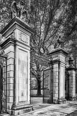 Ornate Iron Gate with Statues Photograph