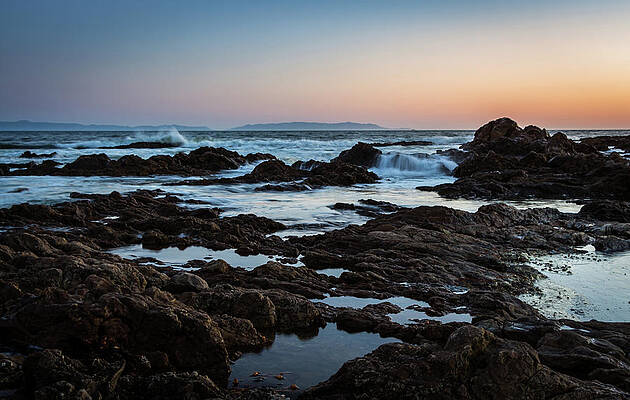Sky Photograph - Rocky Coast by Ed Clark