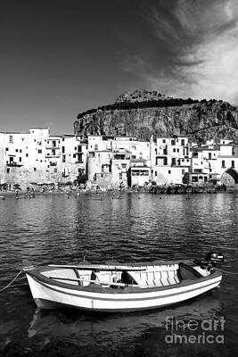 Transportation Wall Art featuring the photograph Rowboat Along An Idyllic Sicilian Village. by Stefano Senise