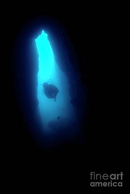 France Photograph - Scuba Diver Swimming Inside A Underwater Fault by Sami Sarkis Photography