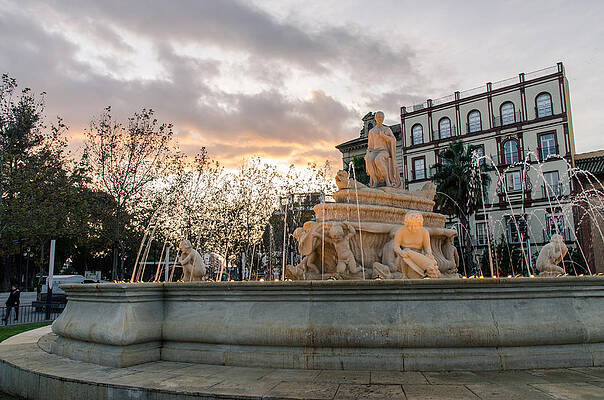Scenic Wall Art featuring the photograph Seville At Sunset - Puerta Jerez by AM FineArtPrints