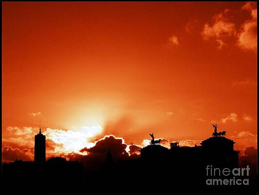 Sky Wall Art featuring the photograph Silhouette Of Rome Against A Sunset Sky by Stefano Senise