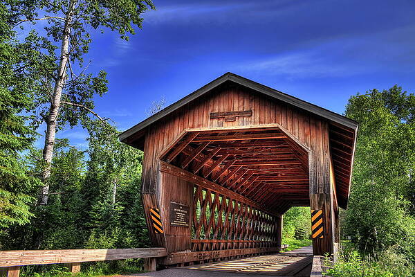 Wis Photograph - Smith Rapids Bridge Under Blue Skies by Dale Kauzlaric