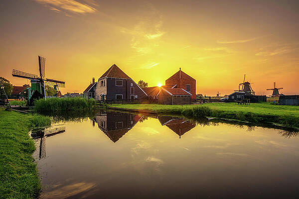 Vintage Wall Art featuring the photograph Sunset Above Farm Houses And Windmills Of Zaanse Schans In The Netherlands by Miroslav Liska