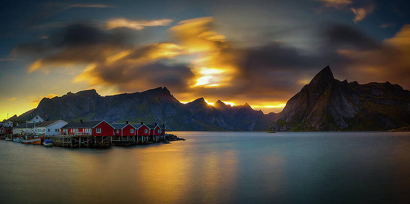 Wall Art featuring the photograph Sunset Above Mount Olstind And The Village Of Hamnoy In Norway by Miroslav Liska