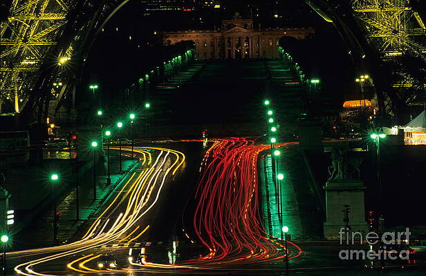 City Photograph - Tail Lights At Feet Of Eiffel Tower By Night by Sami Sarkis Photography