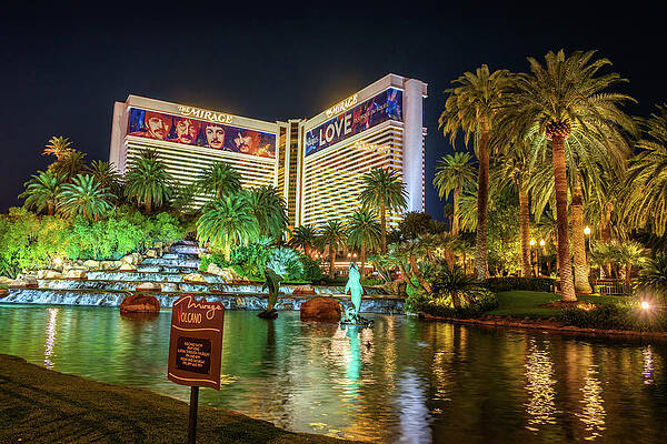Tourism Wall Art featuring the photograph The Mirage Hotel At Night In Las Vegas by Miroslav Liska