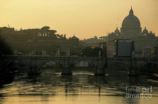 Wall Art featuring the photograph The Sant Angelo Bridge And The Papal Basilica Of Saint Peter At Sunset In Vatican City by Sami Sarkis Photography