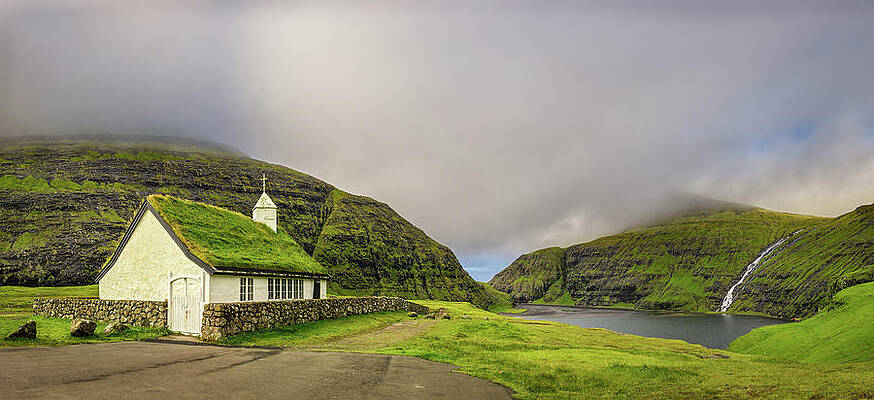 Wall Art featuring the photograph Village Church And A Lake In Saksun, Faroe Islands, Denmark by Miroslav Liska