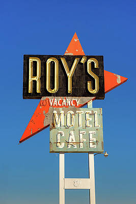 Vintage Wall Art featuring the photograph Vintage Neon Sign Of Roy's Motel And Cafe On Route 66 by Miroslav Liska