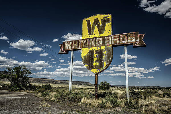 Vintage Wall Art featuring the photograph Vintage Whiting Bros. Sign In New Mexico by Miroslav Liska