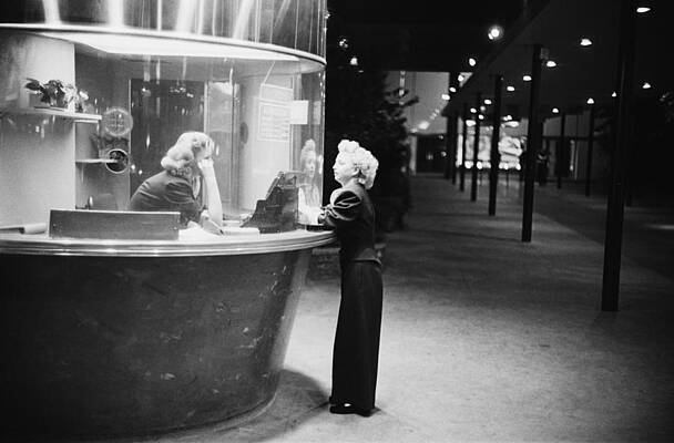Ticket Booth Encounter at Night Wall Art