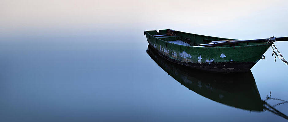 Lonely Boat on Tranquil Waters Wall Art