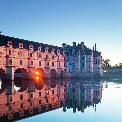 Wall Art featuring the digital art France, Centre, Loire Valley, Indre-et-loire, Chenonceaux, Chenonceau Castle, The Chateau On The River Cher Illuminated At Sunset #1 by Luigi Vaccarella