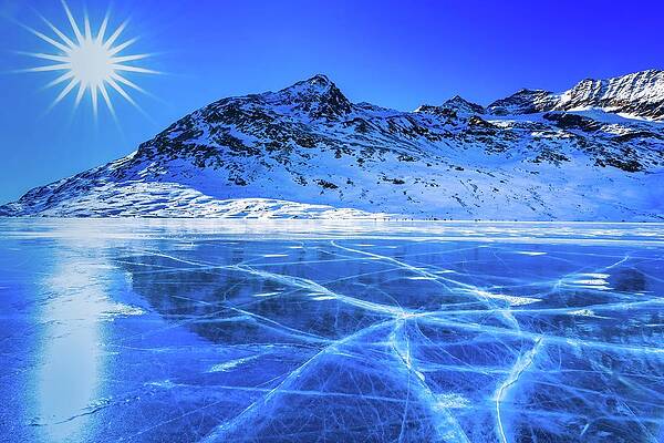 Freeze Wall Art featuring the digital art Ice Cracks In The Frozen Lake #1 by Lucie Debelkova