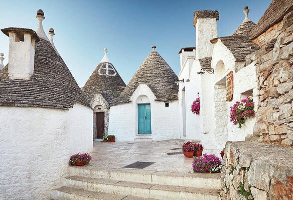 Facade Wall Art featuring the digital art Italy, Apulia, Bari District, Itria Valley, Alberobello, Famous For Its Unique Trullo Buildings #1 by Richard Taylor