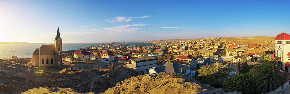 Wall Art featuring the photograph Luderitz In Namibia With Lutheran Church Called Felsenkirche At Sunset #1 by Miroslav Liska
