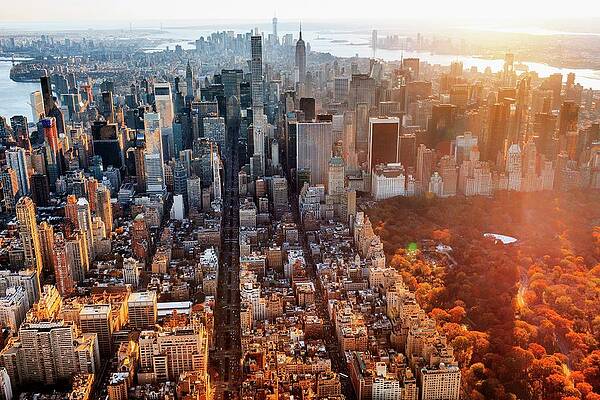 U S Wall Art featuring the digital art New York City, Manhattan, Central Park, Aerial View Towards Central Park With Foliage, Empire State Building And One World Trade Center At Sunset #1 by Antonino Bartuccio