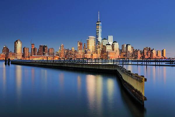 Hudson New York Wall Art featuring the digital art New York City, Manhattan, Lower Manhattan, One World Trade Center, Freedom Tower, View Across The Hudson River Of The Downtown Manhattan And Financial District Skyline From New Jersey #1 by Riccardo Spila