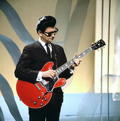 Musician with Red Electric Guitar Photograph