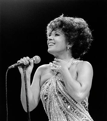 Singer Performing on Stage Photograph